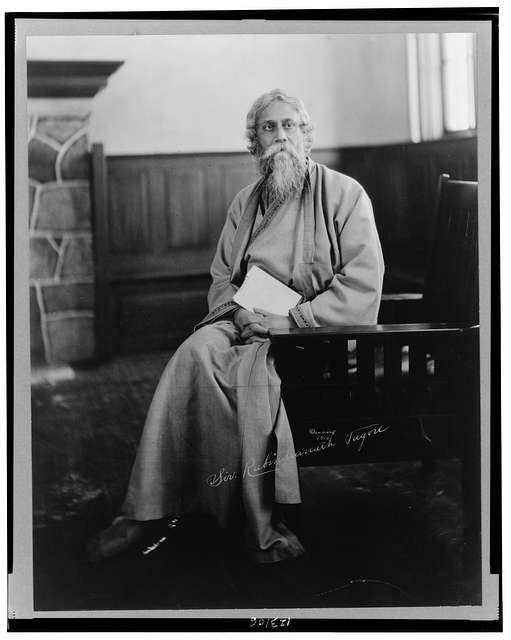 rabindranath-tagore-full-length-portrait-seated-facing-front-Yyv7L77NLMu6Jyv7